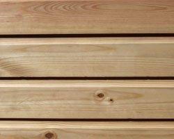 A closeup of western red cedar lap siding